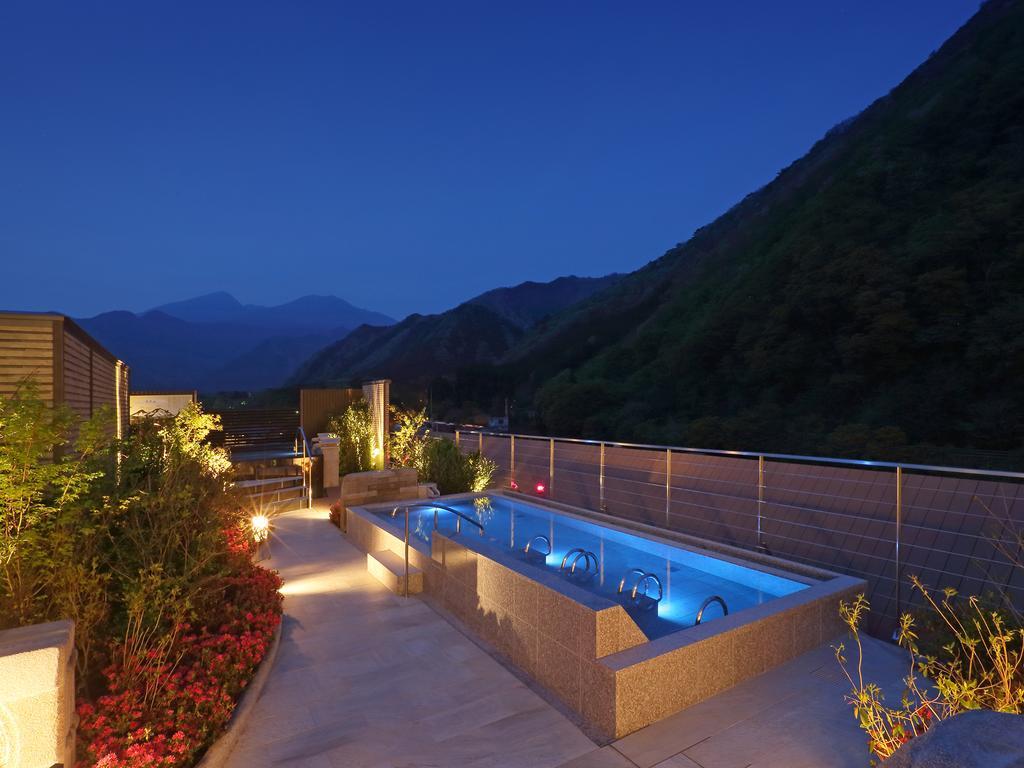 Asaya Hotel Нико Екстериор снимка A rooftop onsen in Japan