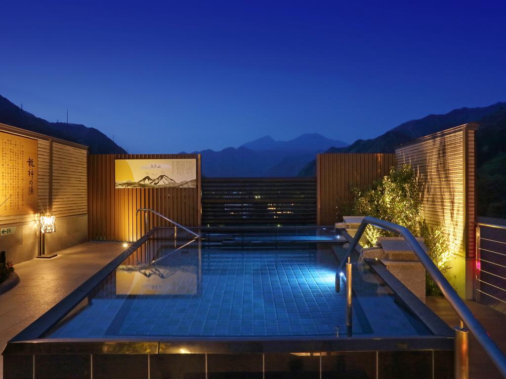 Asaya Hotel Нико Екстериор снимка A rooftop onsen in Japan