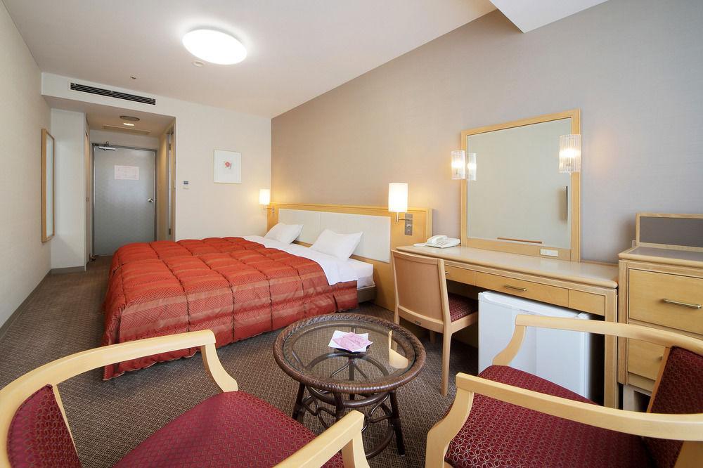 Asaya Hotel Нико Екстериор снимка A room at the hotel