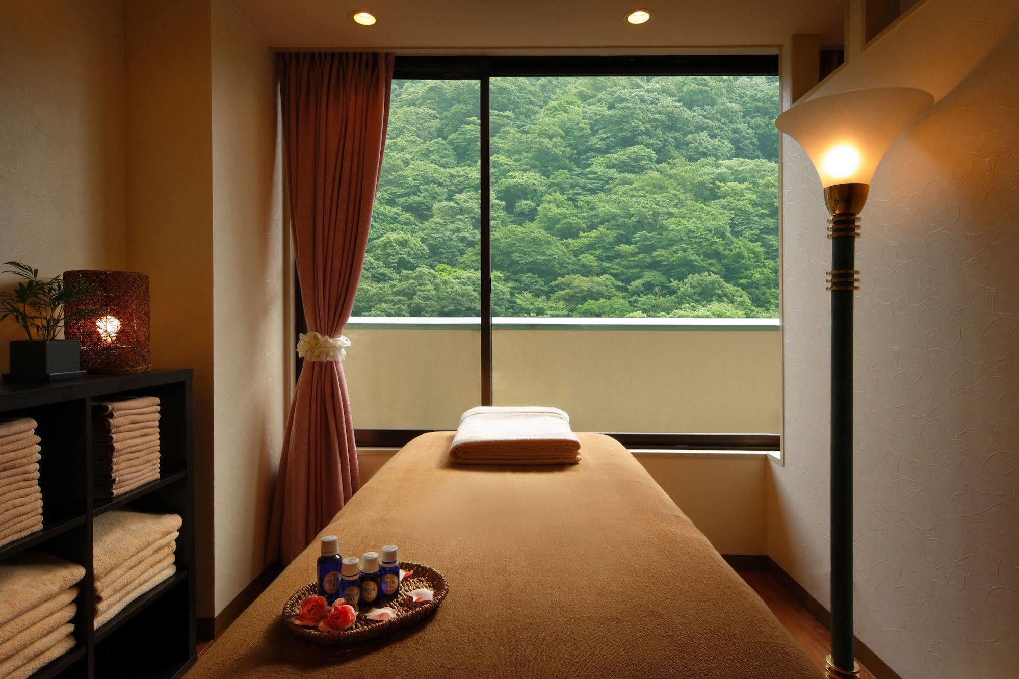 Asaya Hotel Нико Екстериор снимка A treatment room at a spa